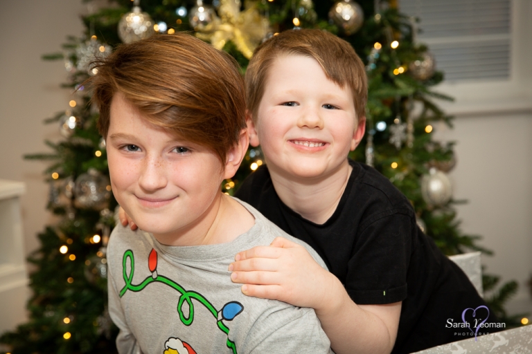 Portrait photography of brothers piggyback